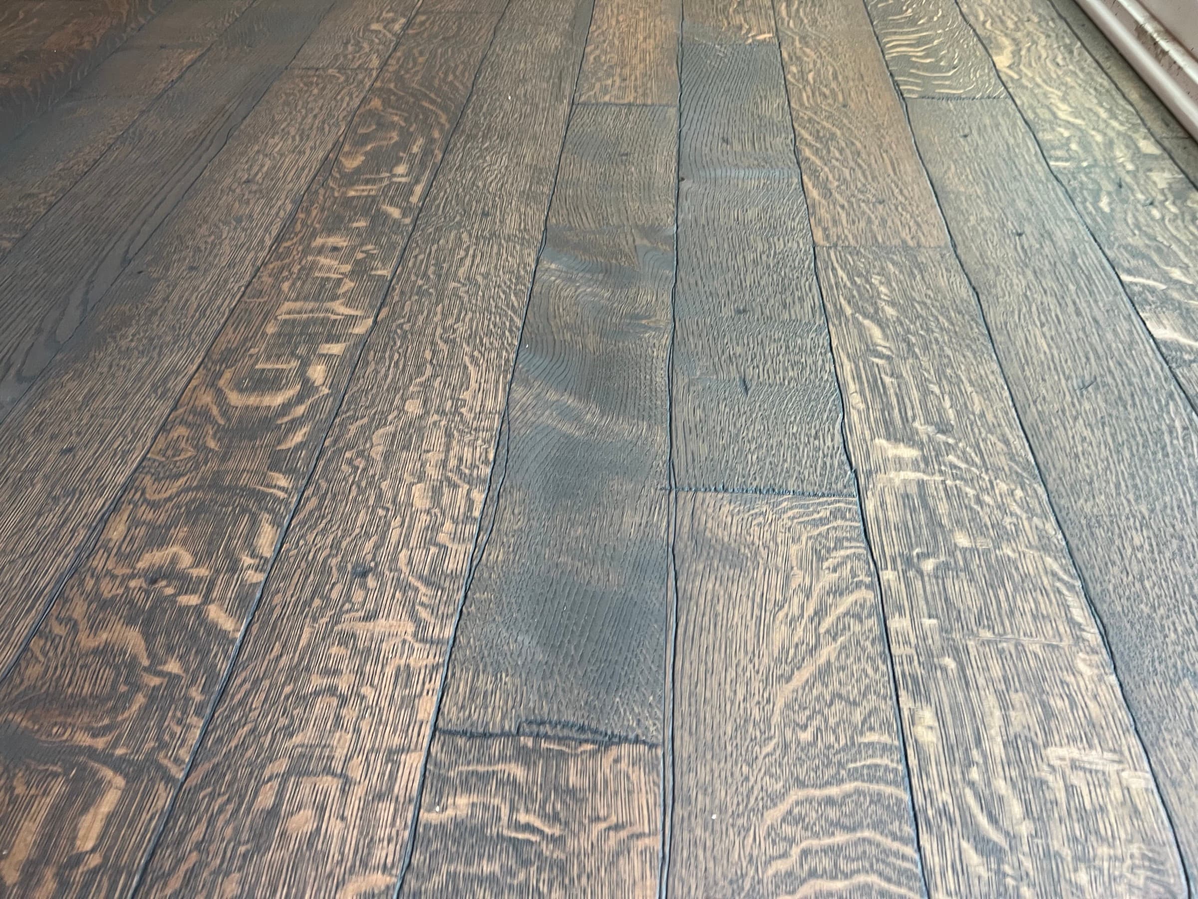 Dark stained wire-brushed white oak hardwood floor refinishing Clayton NC
