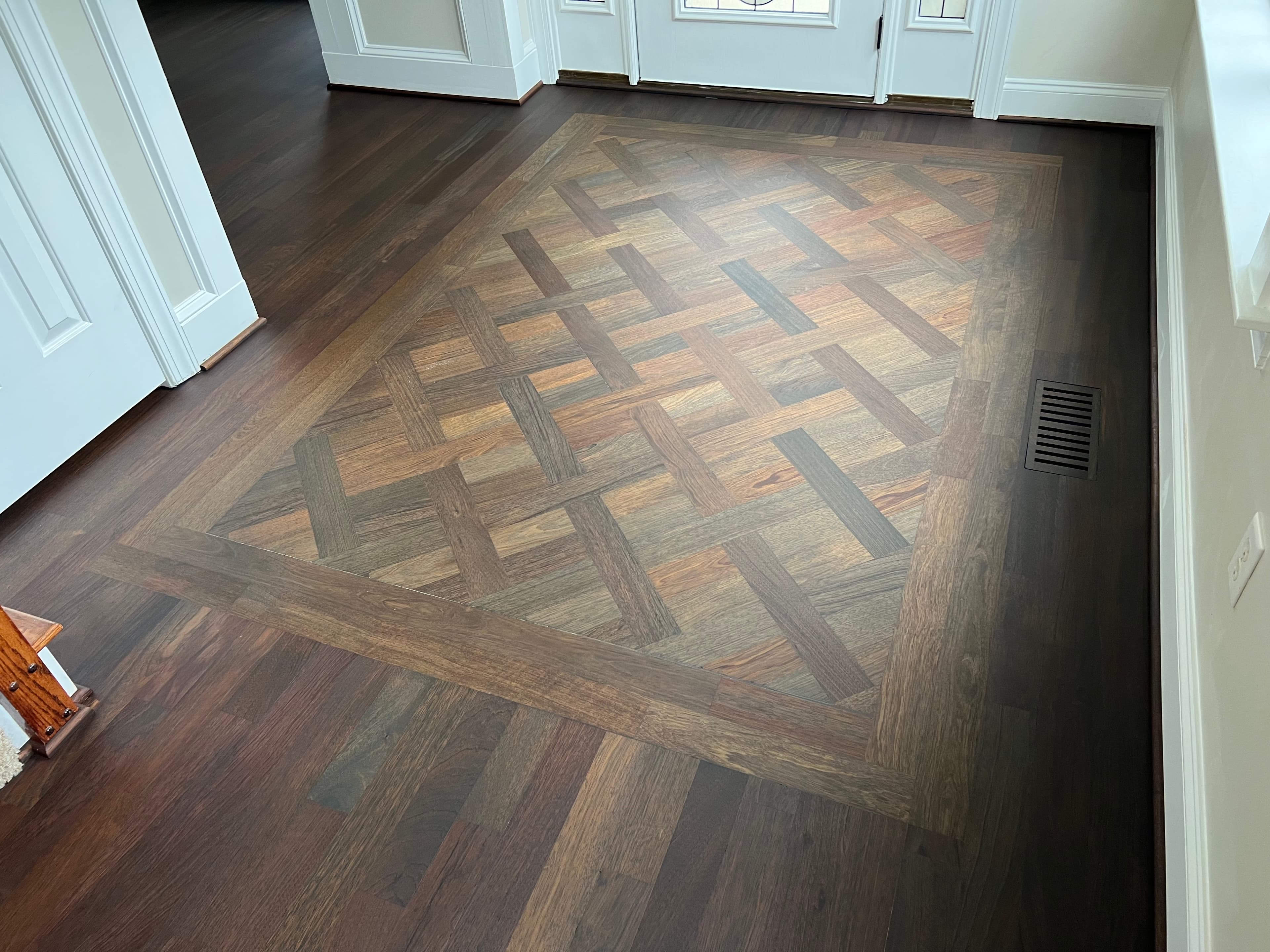custom basketweave hardwood floor inlay installed by 12th And Oak Floor Co in Clayton NC